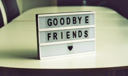 A sign that says goodbye friends