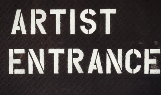A sign that says artist entrance