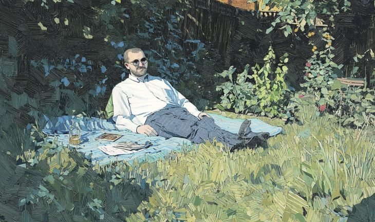 a man in a suit in the garden 