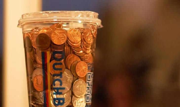 Coins in a cup