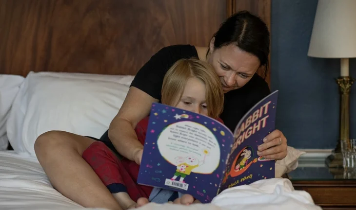 a mother reading a story 