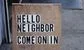 A sign that says hello neighbor come on in