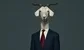 a goat in a suit 