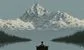 a banker at a desk in front of a mountain 
