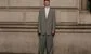 a man in a large suit 